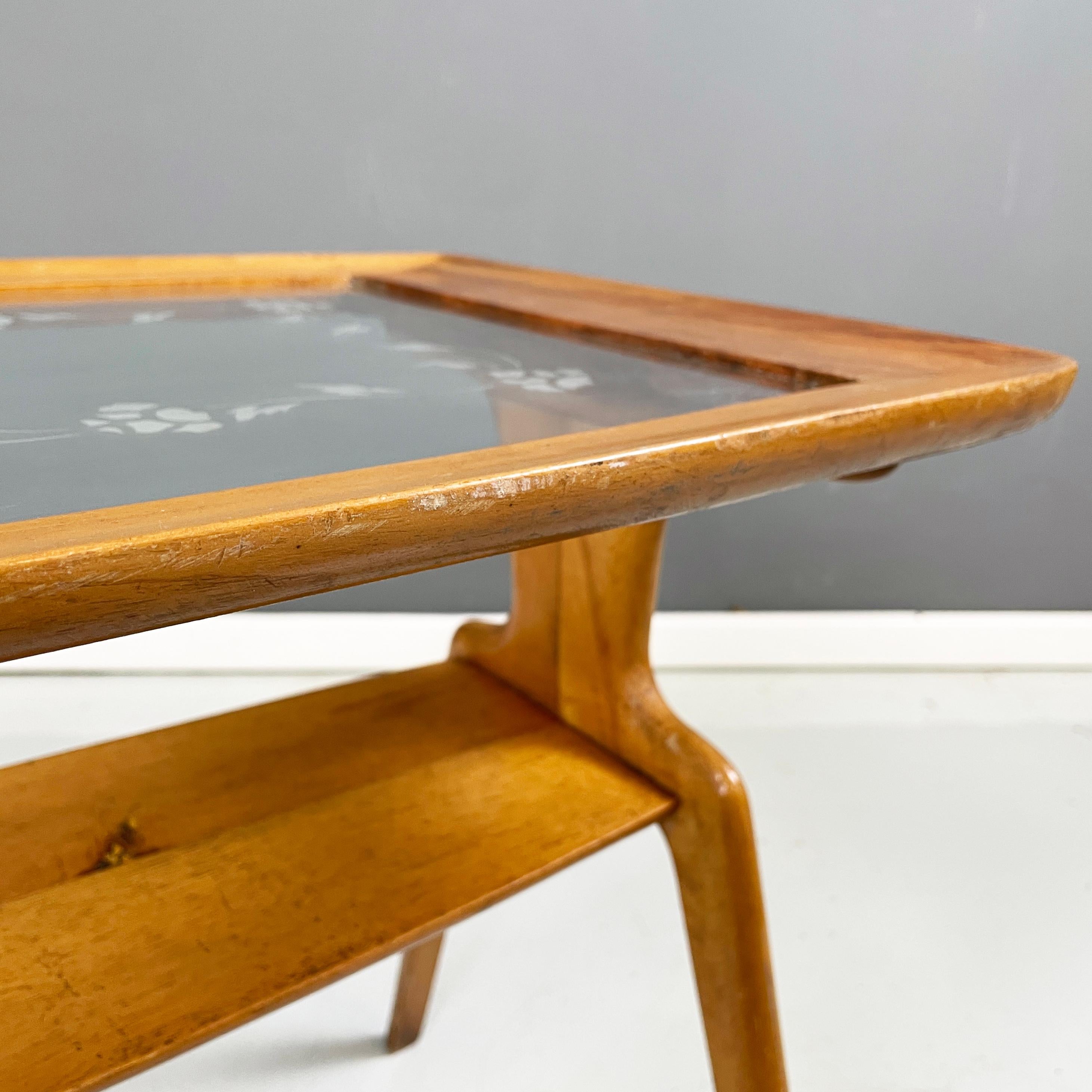 Glass Italian mid-century modern Coffee table in wood and decorated glass, 1950s For Sale