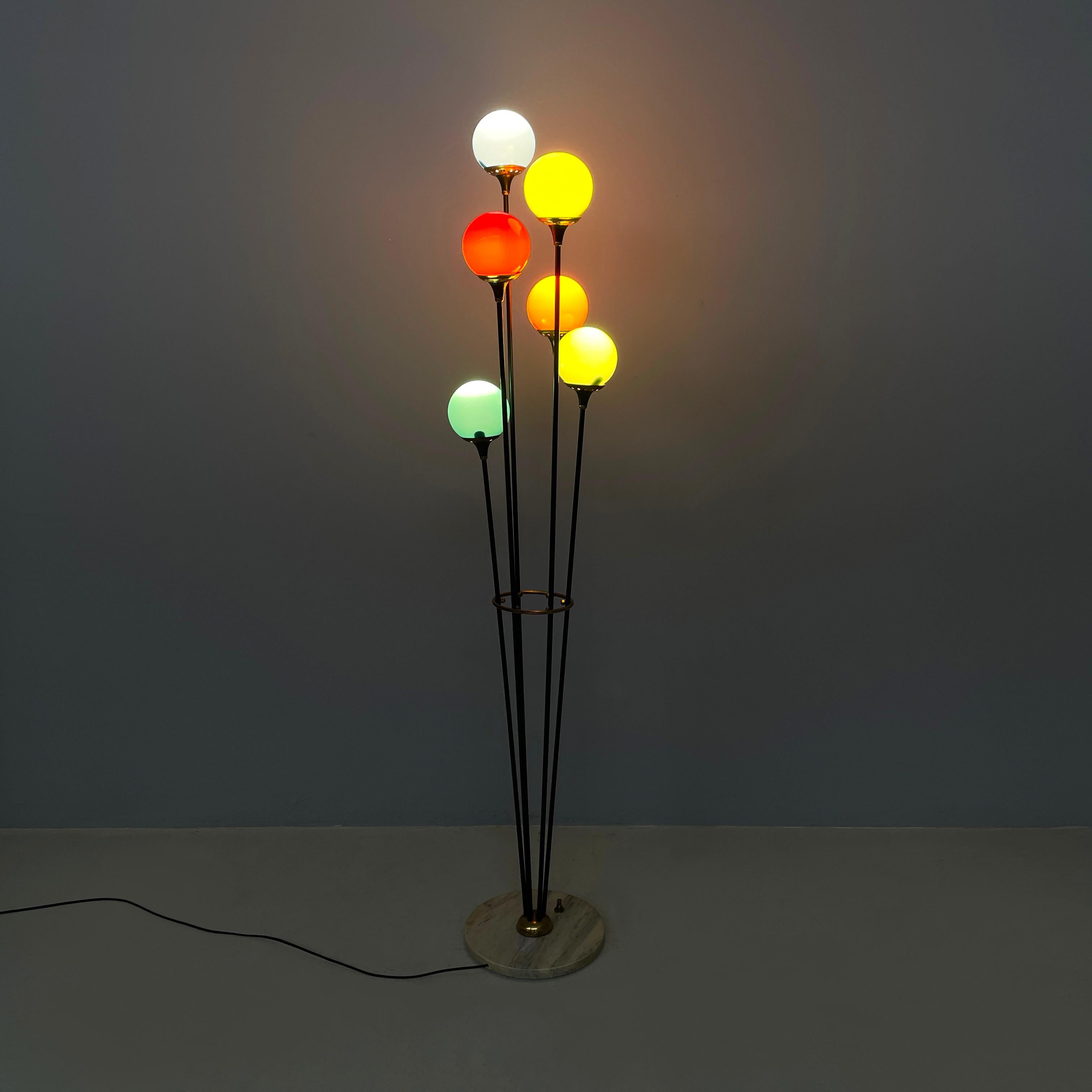Italian mid-century modern Colored glass Floor lamp Alberello by Stilnovo, 1950s
Floor lamp mod. Alberello with round base. The central structure is made up of six black painted metal and brass rods, which end respectively in six light points with