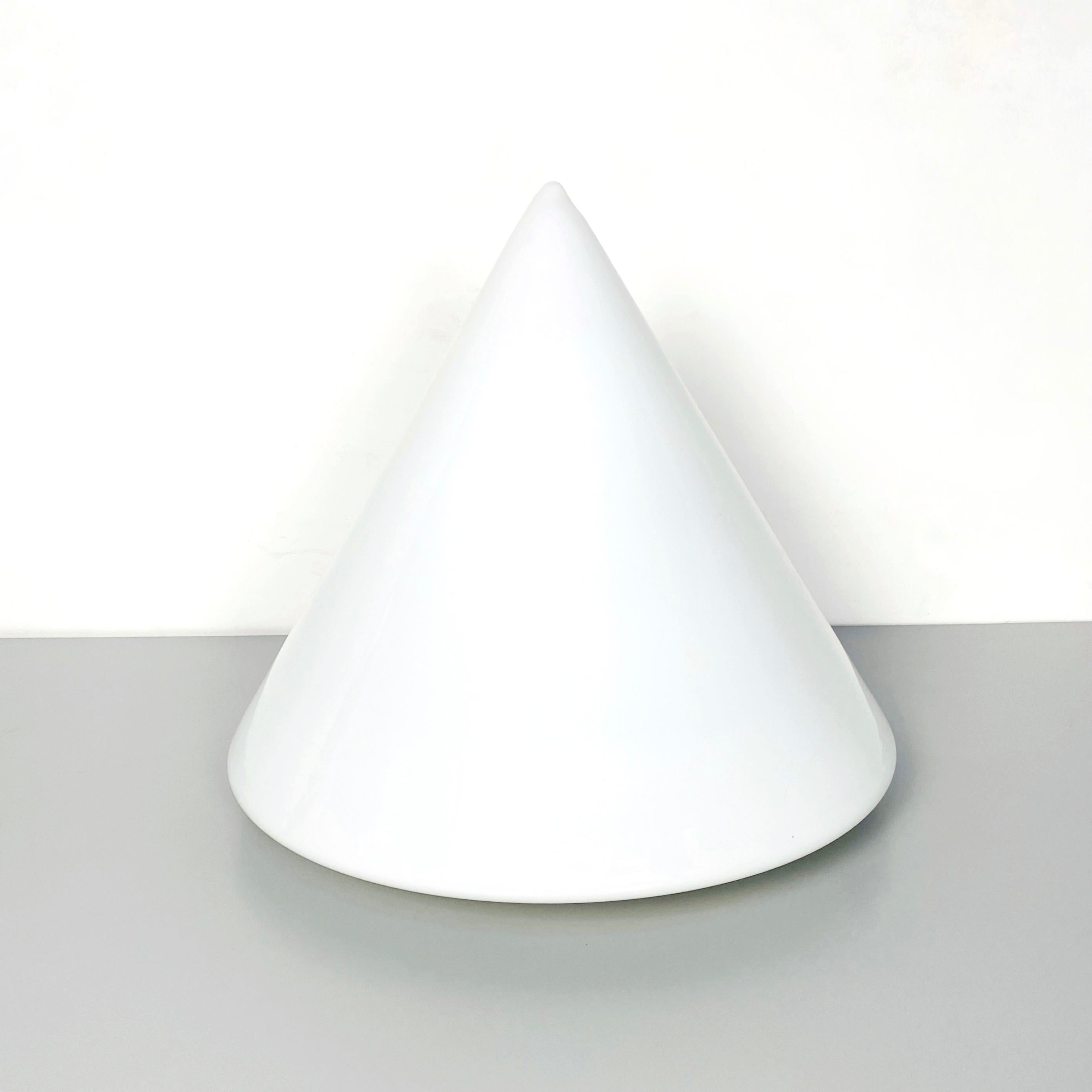 Italian Mid-Century Modern conical table lamp with double opal glossy glass, 1970s
Conical table lamp with double opal and glossy glass. 

Excellent condition 

Measures: 56 x 52 H cm.