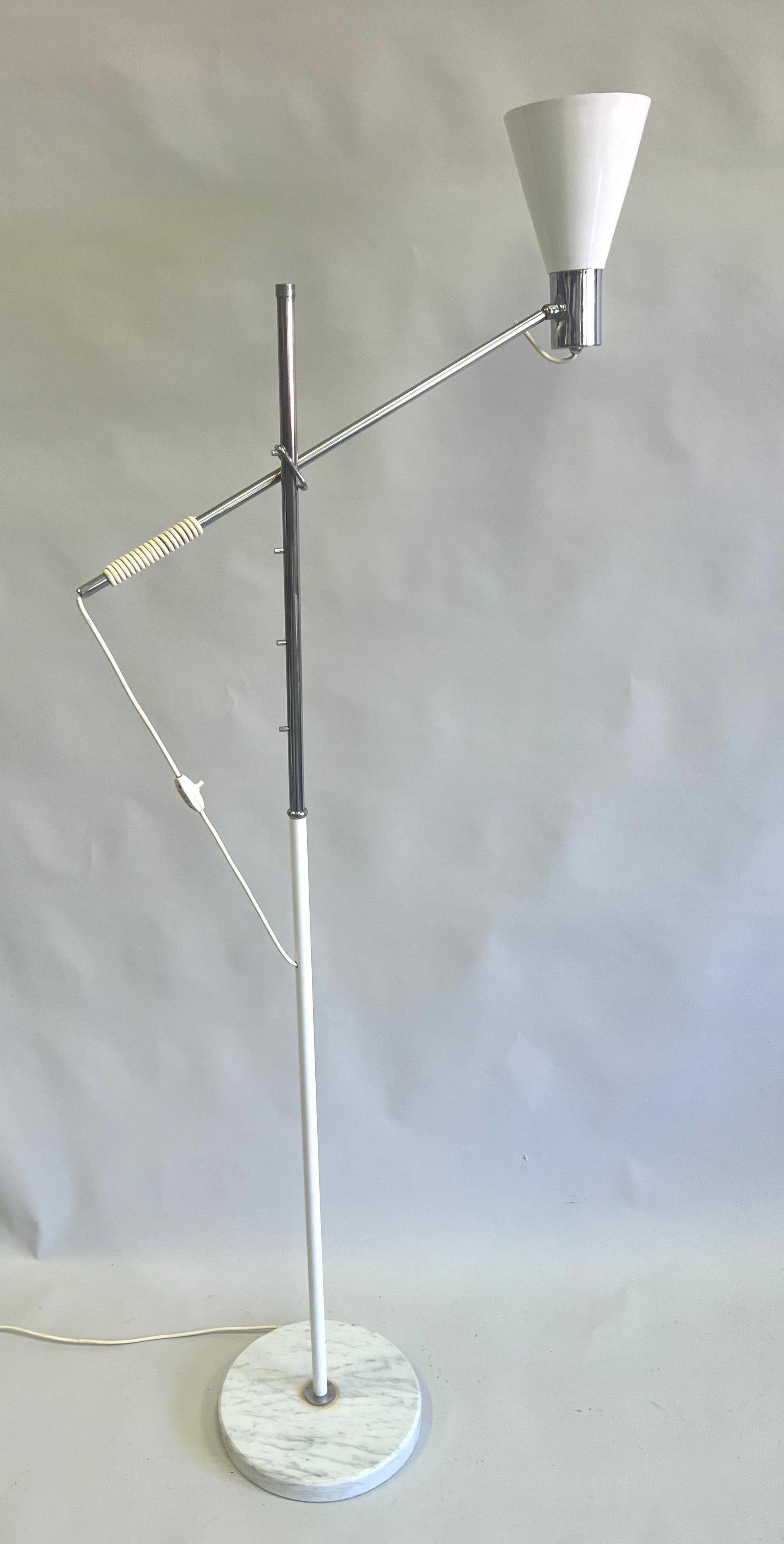 A Rare Model Italian Mid-century Modern Cantilevered Floor Lamp, attributed to Angelo Lelli and Arredoluce,  exhibiting innovative engineering, craftsmanship and aesthetics. The standing lamp features a single cantilevered arm supported by a unique