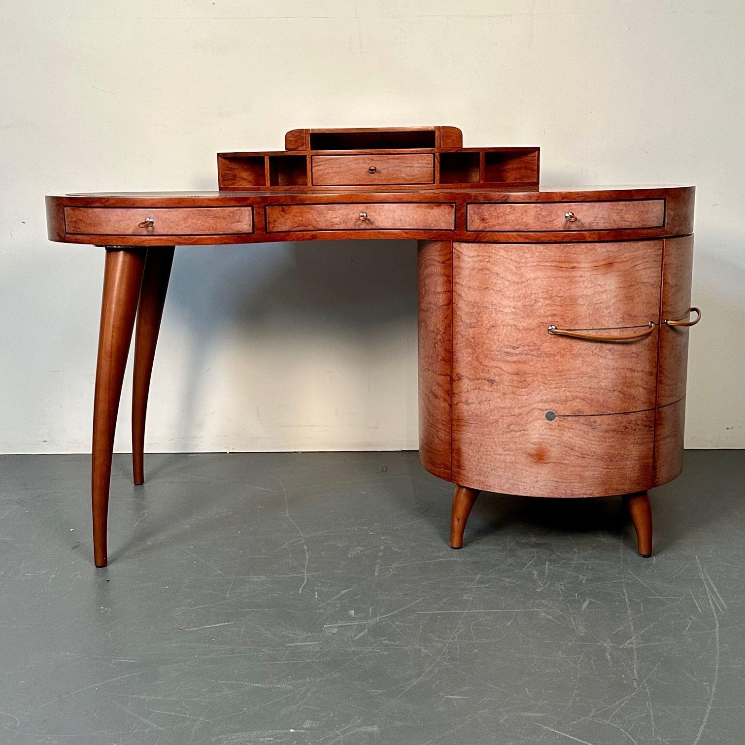 Italian Mid-Century Modern Desk / Writing Table by Maurice Villency, Deco Style

A sleek and stylish deco style design desk by Maurice Villency. Having a circular side table leading to a knee hole desk with two drawers under a leather table top