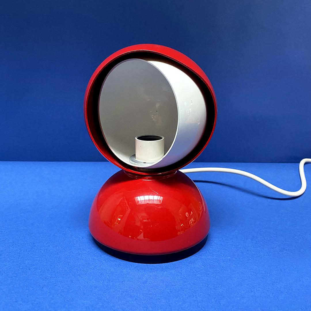 Italian Mid-Century Modern Eclissi lamp by Vico Magistretti for Artemide, 1967
Eclissi lamp in red and white metal on the inside and swivel, its internal lampshade in fact thanks to the rotation allows you to adjust the light source and can provide