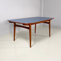 Italian mid-century modern extendable dining table in wood and blue formica 1960