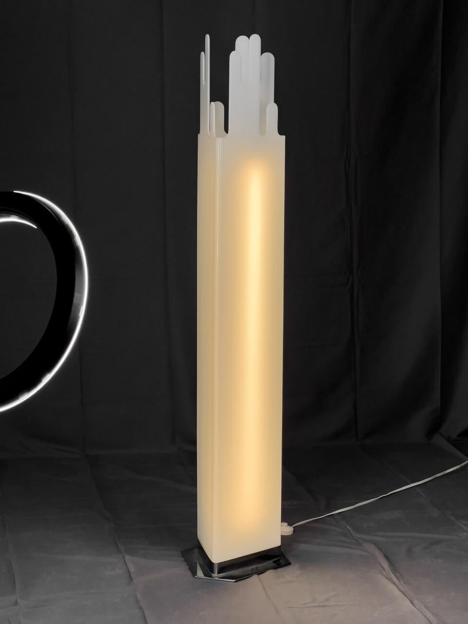 Mid-Century Modern floor lamp Unsigned but identical to designs by the noted architect Ettore Sottsass. The lamp which was manufactured in Milan, Italy has been brought up to U.S. electrical standards and the original fluorescent tube has been