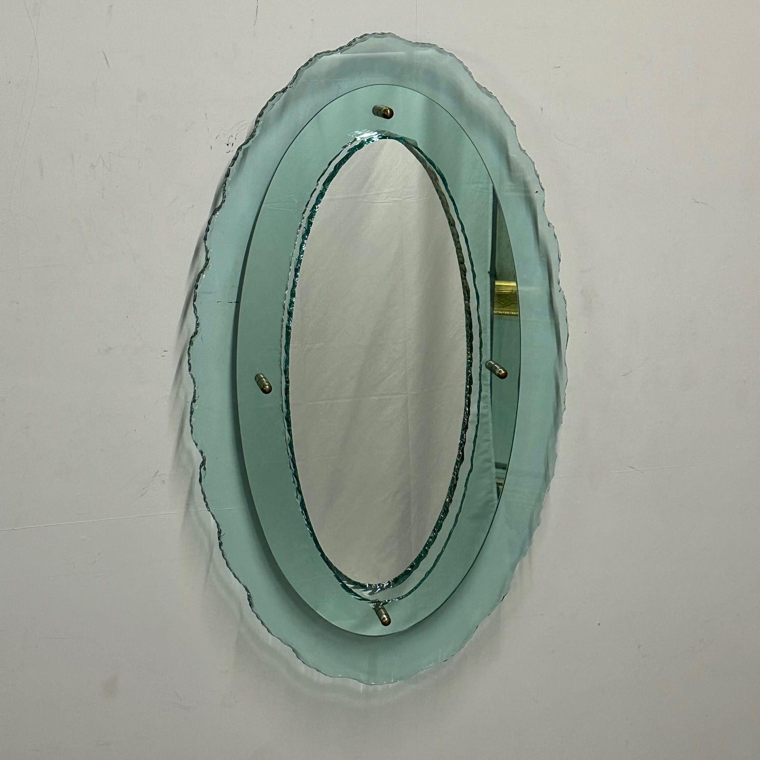 Italian Mid-Century Modern Fontana Arte Oval Glass Wall Mirror or Mirrored Plateau Tray
A stunning rare and important wall mirror or mirrored plateau tray. This duel Fontana Arte work of art is quite possibly the finest most versatile piece from