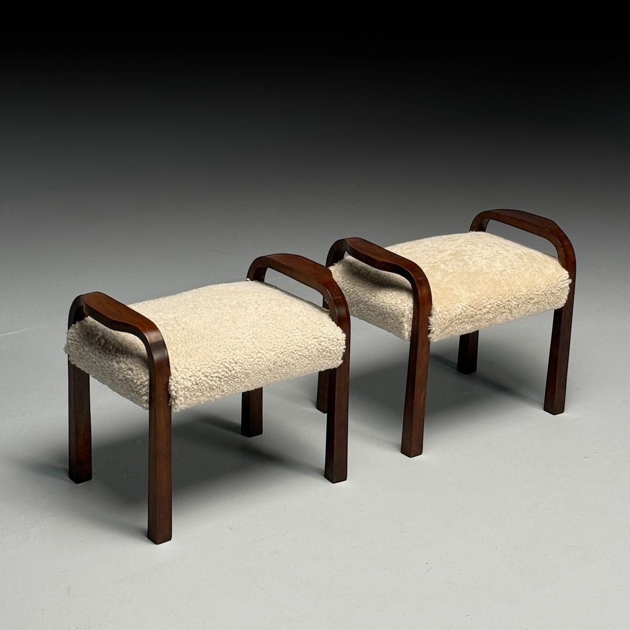 Italian Mid-Century Modern, Footstools or Ottomans, Beige Sheepskin, Mahogany, Italy, 1950s

A pair of Italian modernist footstools or ottomans from the 1950s, newly upholstered in genuine beige Australian sheepskin, with exposed mahogany wooden