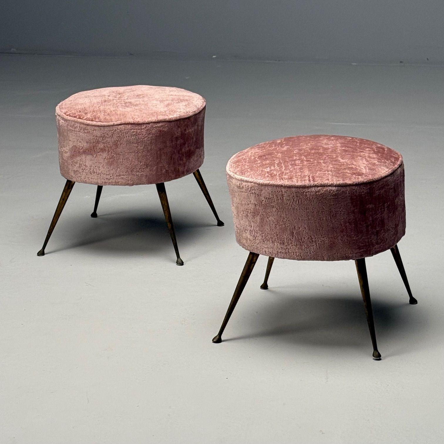 Italian Mid-Century Modern, Footstools, Patinated Brass, Pink Velvet, 1950s

This elegant pair of modernist Italian stools, designed in the 20th century, features beautifully patinated brass legs that taper gracefully toward the feet, creating a
