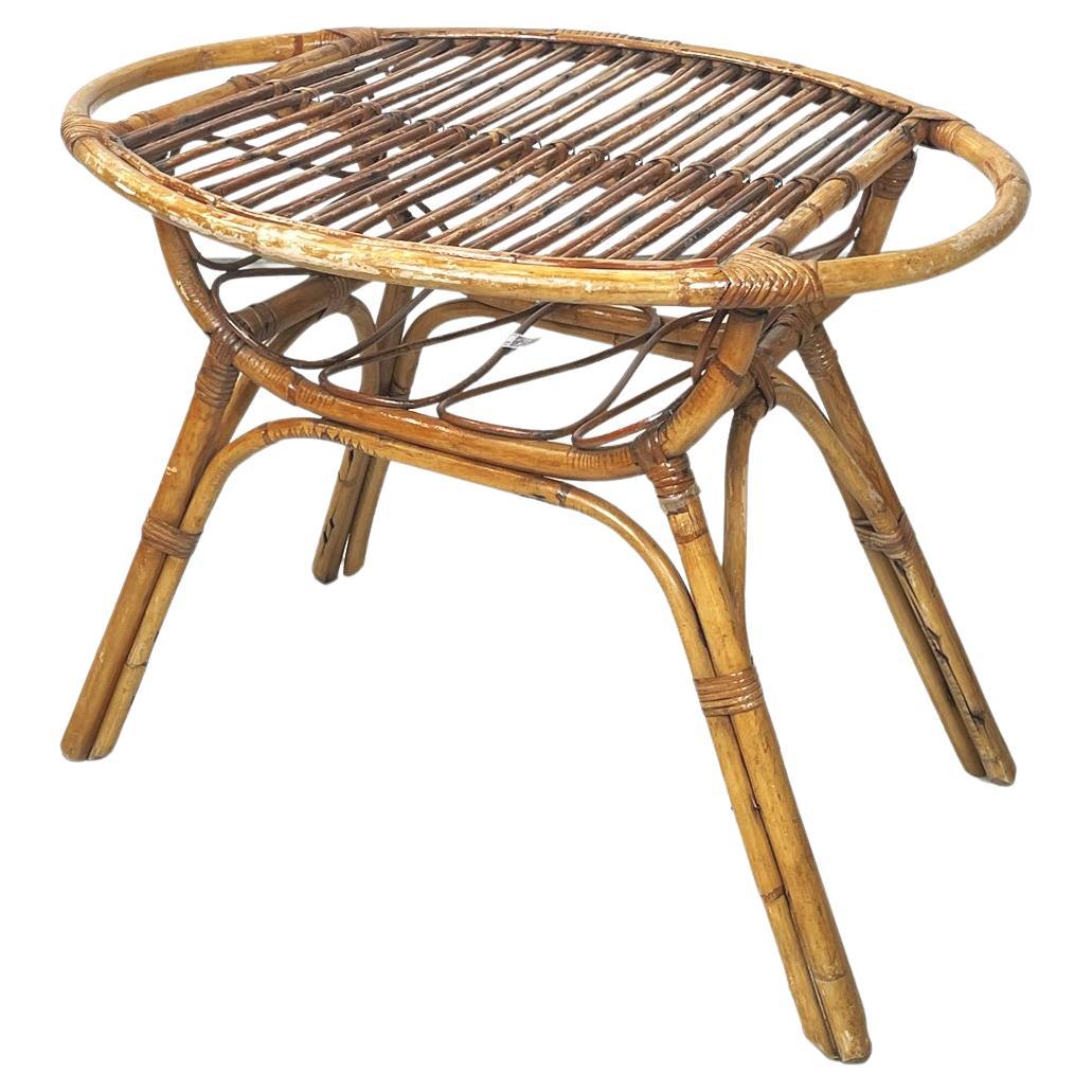 Italian mid-century modern Garden oval coffee table in rattan, 1960s For Sale