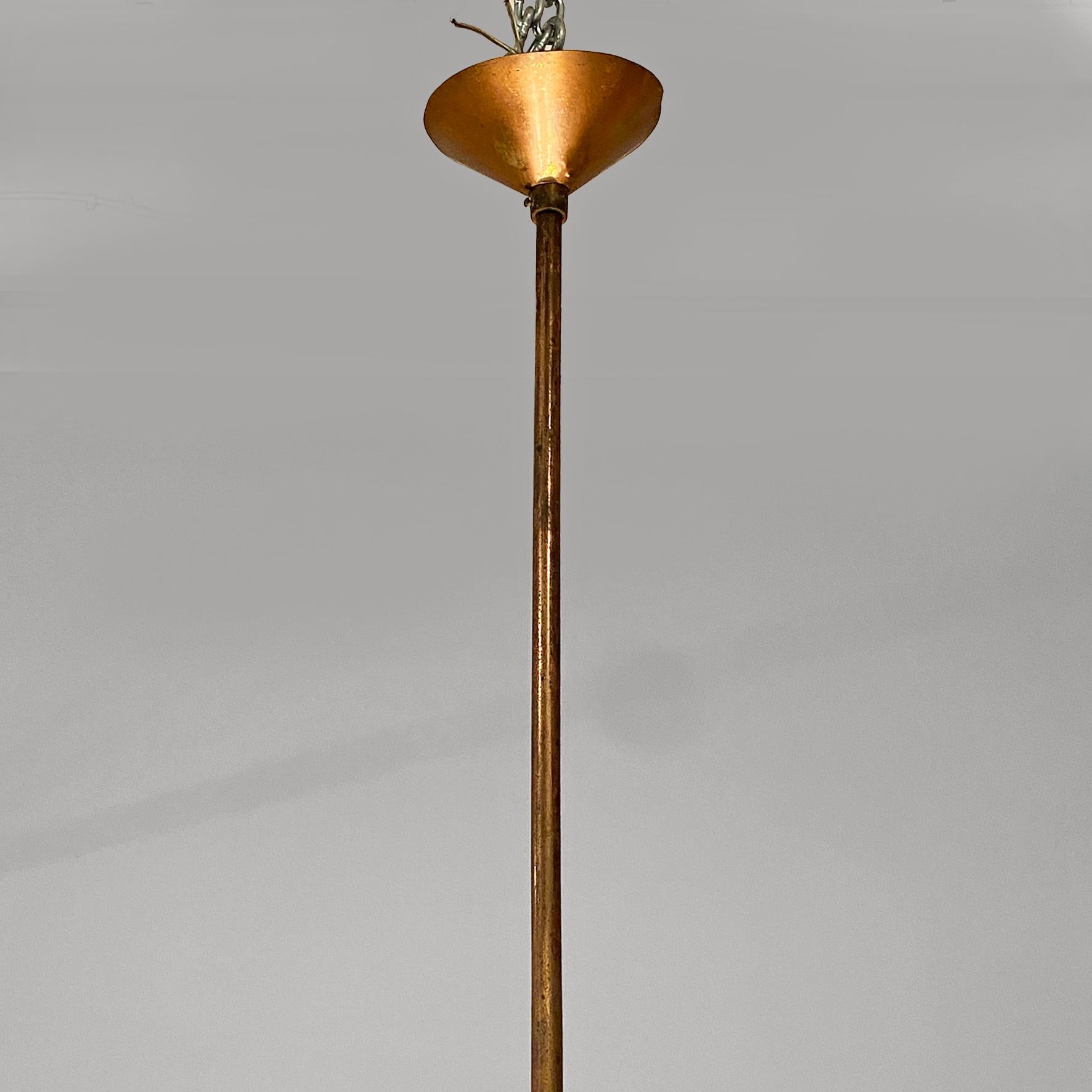 Aquamarine green glass chandelier with white drawn decoration on the surface of the same diffuser, with a copper sheet band in the lower part and with a second lower diffuser in white opaline glass, with a copper wire cover cup and brass stem.