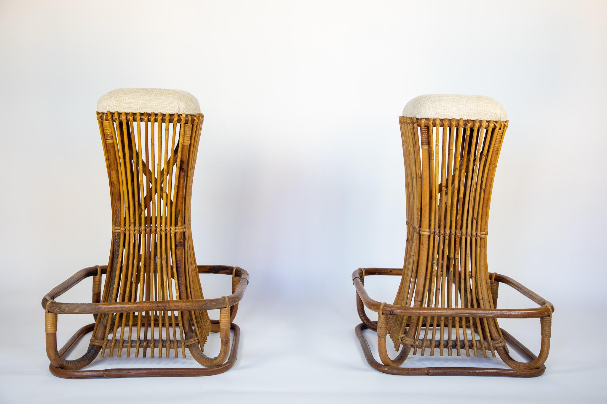 Handcrafted Rattan Bar Stools by Tito Agnoli, Italy 1960s.

This set of Mid-Century Modern rattan bar stools was handcrafted by Tito Agnoli for Bonacina in 1960s. Made from high-quality natural materials, this set is in a good original condition