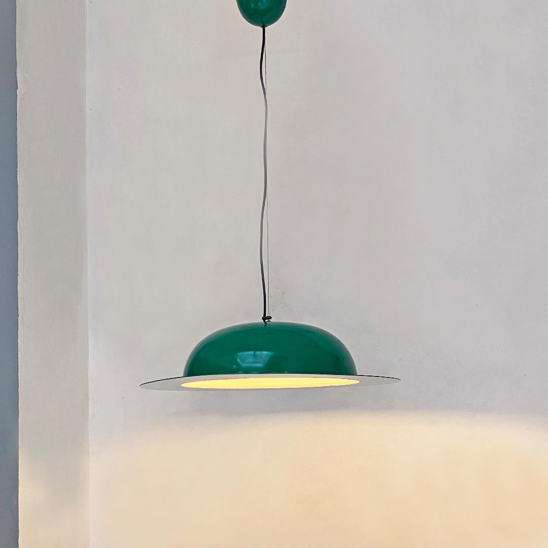 Italian mid-century modern hat-shaped green metal chandelier, 1970s
Hat-shaped green chandelier in painted metal, glossy green on the outside and matt white on the inside.

Good condition, some marks on the lampshade.

Measurements 59x90H cm.