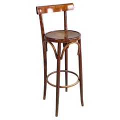 Italian mid-century modern High bar stool with footrest in wood, 1900-1950s