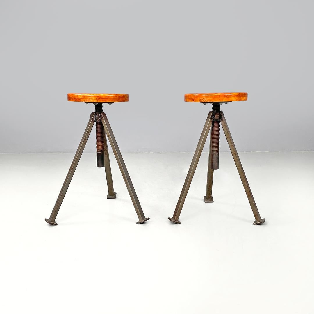 Italian mid-century modern industrial adjustable stools in wood and metal, 1960s In Fair Condition For Sale In MIlano, IT