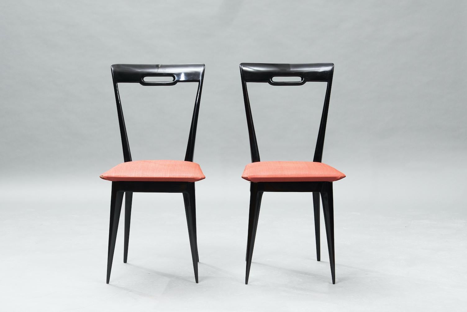 Italian Mid-Century Modern Italian dining chairs in ebonized wood upholstered in the original pegamoid, set of six.