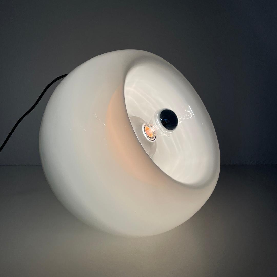 Italian mid-century modern lamp Vacuna Eleonore Peduzzi Riva for Artemide, 1960s
Round table lamp mod. Vacuna in opaline white Murano glass. The structure is a hemisphere that is shaped by creating a concave curve where the light point is located,