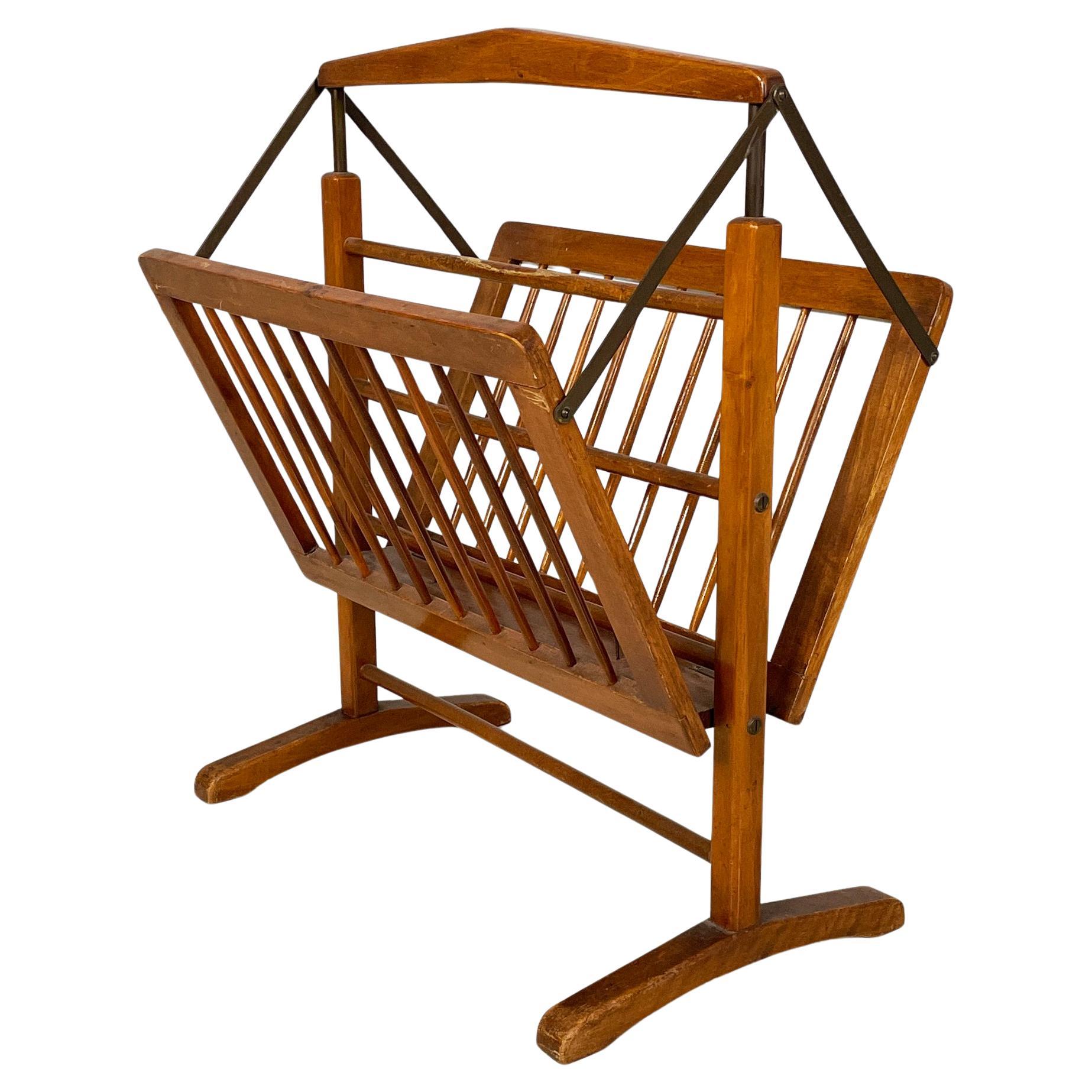 Italian mid-century modern magazine rack in wood and burnished brass, 1960s