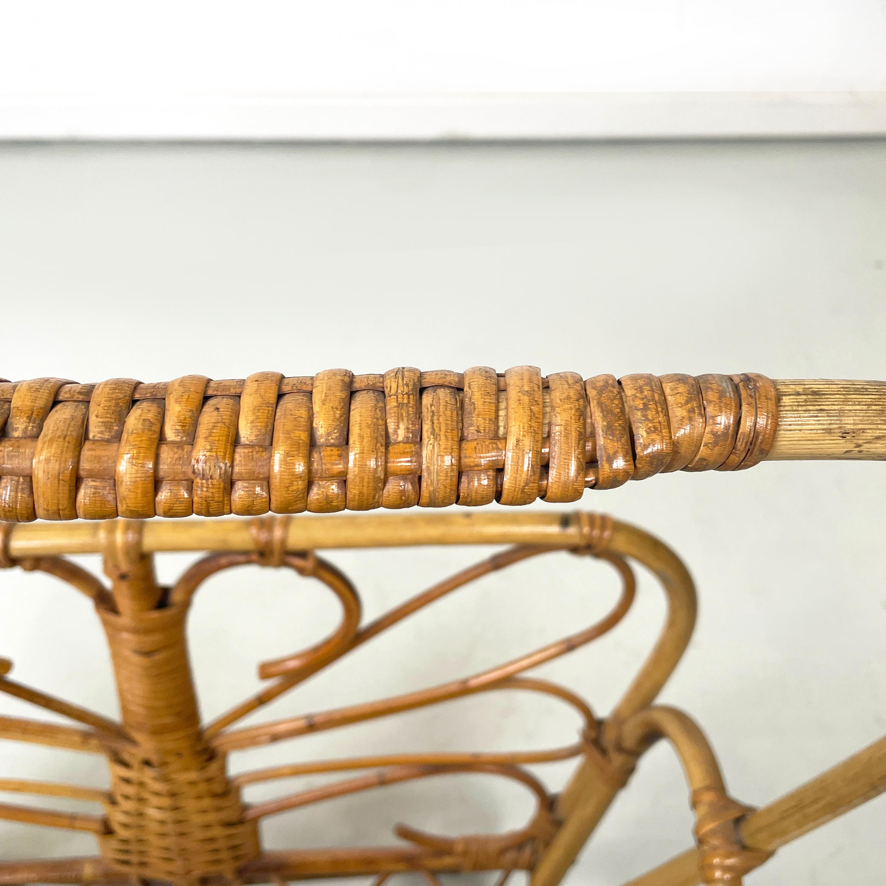 Mid-20th Century Italian mid-century modern Magazine rack in woven rattan with handle, 1960s For Sale