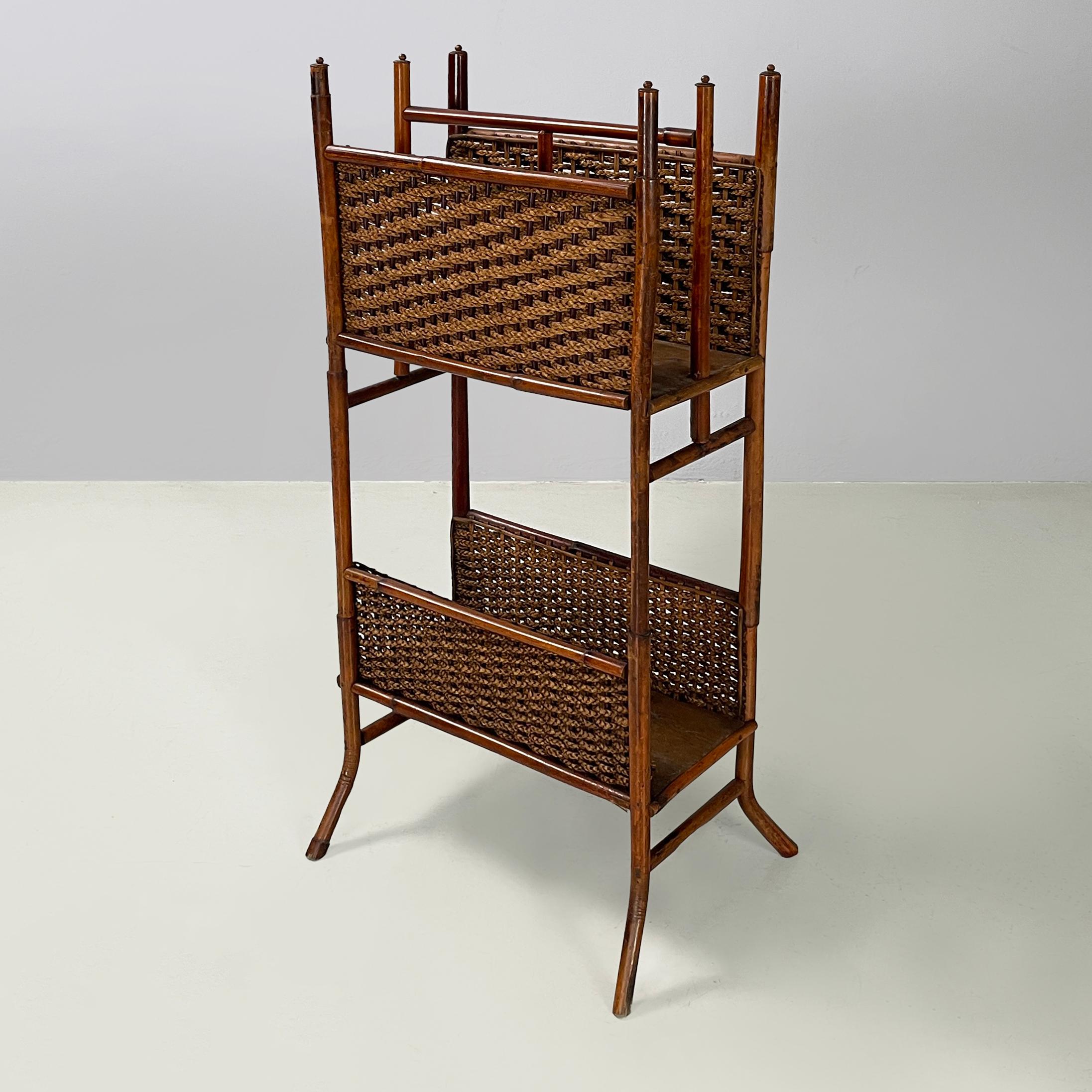 Italian mid-century modern Magazine rack with double shelf in rattan, 1960s
Floor magazine rack with double rectangular shelf, entirely in rattan. On two sides of each shelf features woven rattan. Spherical details at the top of the structure. Round