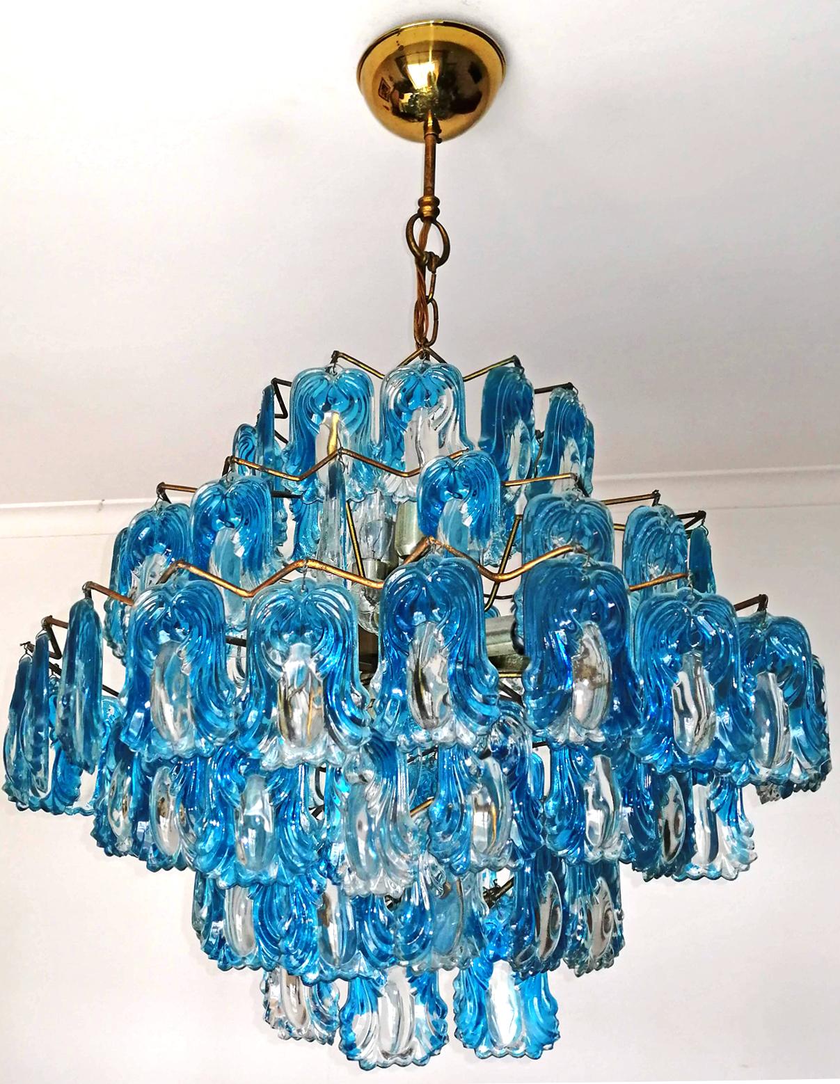 Gorgeous Italian chandelier with 6 layers of turquoise blue glass
Measures:
Diameter 25.6 in / 65 cm
Height 31.5 in (chain 6 in) / 80 cm (chain 15cm)
Weight: 33 lb /15 kg
15-light bulbs E 14/ good working condition/
Assembly required. Bulbs not