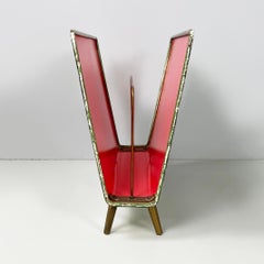 Italian mid-century modern Metal and brass magazine rack by Fornasetti, 1960s