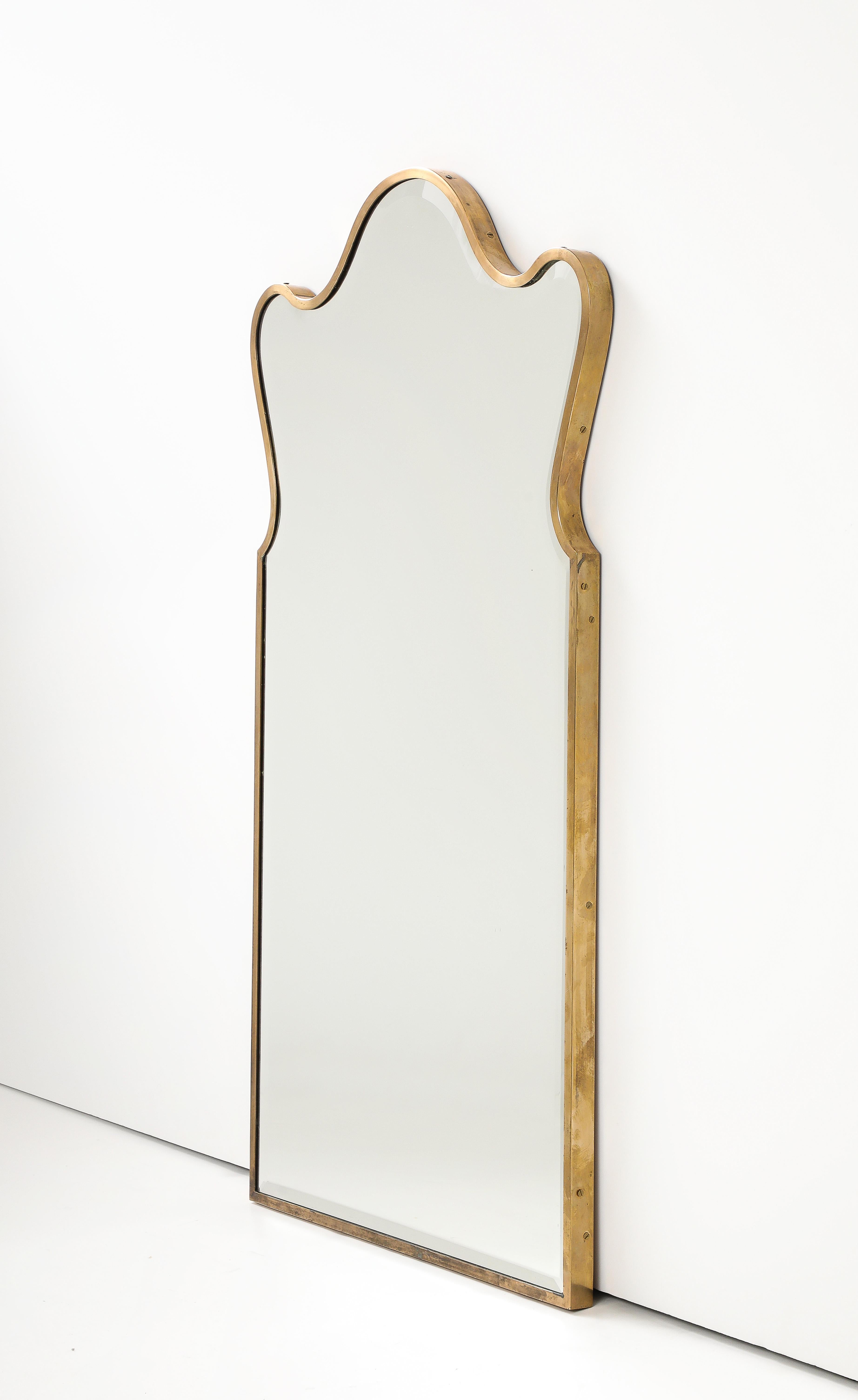 talian Mid Century Modern Mirror with thick Bass Brass and Bevelled Edge, 1950’s

H: 37.5 W: 20.5 D: 1 in.

Depth of frame and the bevel