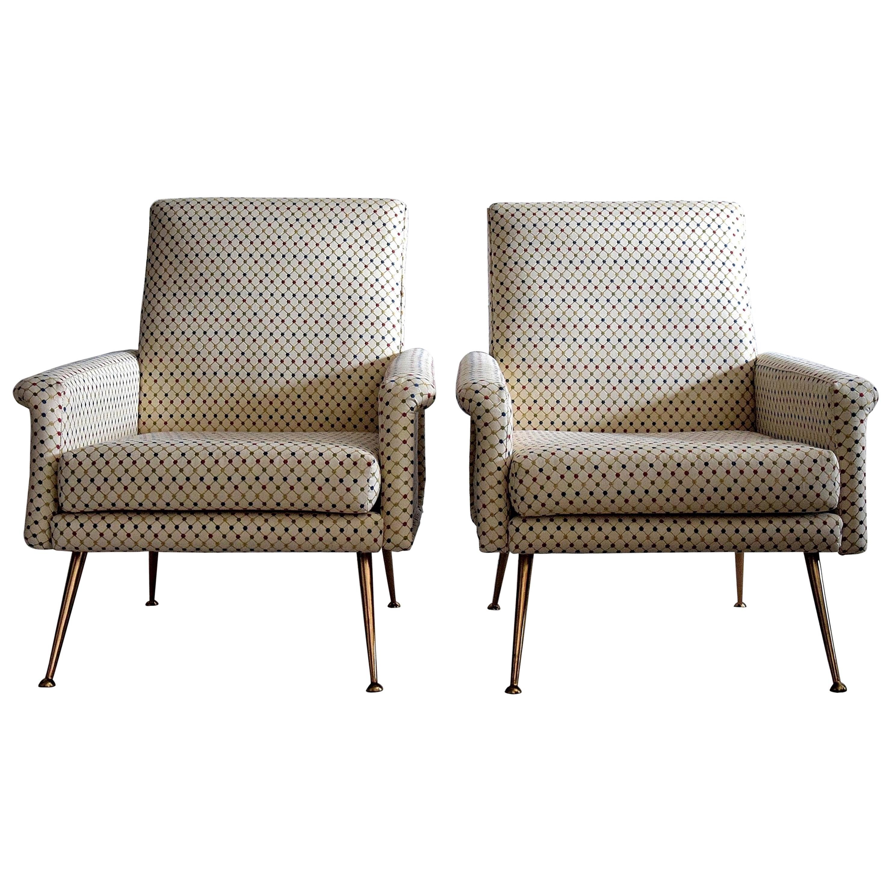 Mid-Century Modern Italian lounge chairs.
Two stylish re-stored and re-upholstered beautiful early 1960s Italian lounge chairs.
The pictures say it all. The main color of the chairs is off white.
This set will only be shipped insured in a custom