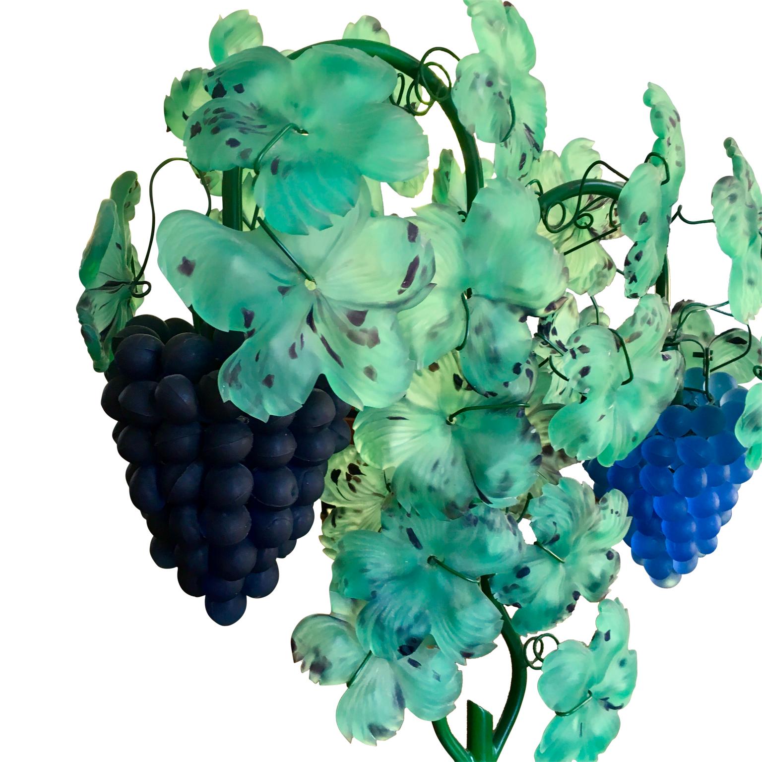 Italian Mid-Century Modern Murano art glass grape and leaf table lamp

A Venetian Italian art glass Murano grape bunch and leaf table lamp. Vines and clusters of grapes. Hand blown art glass, so realistic in gorgeous colors of purples and greens.