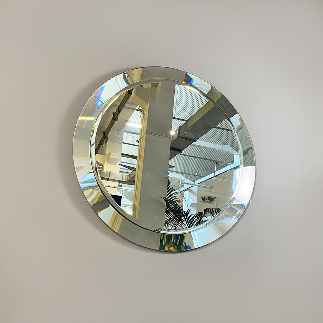 Italian Mid-Century Modern Narciso wall mirror by Sergio Mazza for Artemide, 1960s
Narciso model wall mirror, round shape and large size, with convex frame in nickel-plated aluminum and flat surface on the perimeter.
Project by Sergio Mazza for