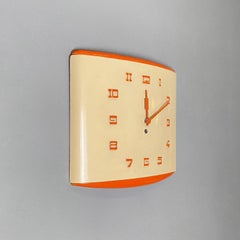 Italian mid-century modern orange and beige rectangular wall clock, 1960s