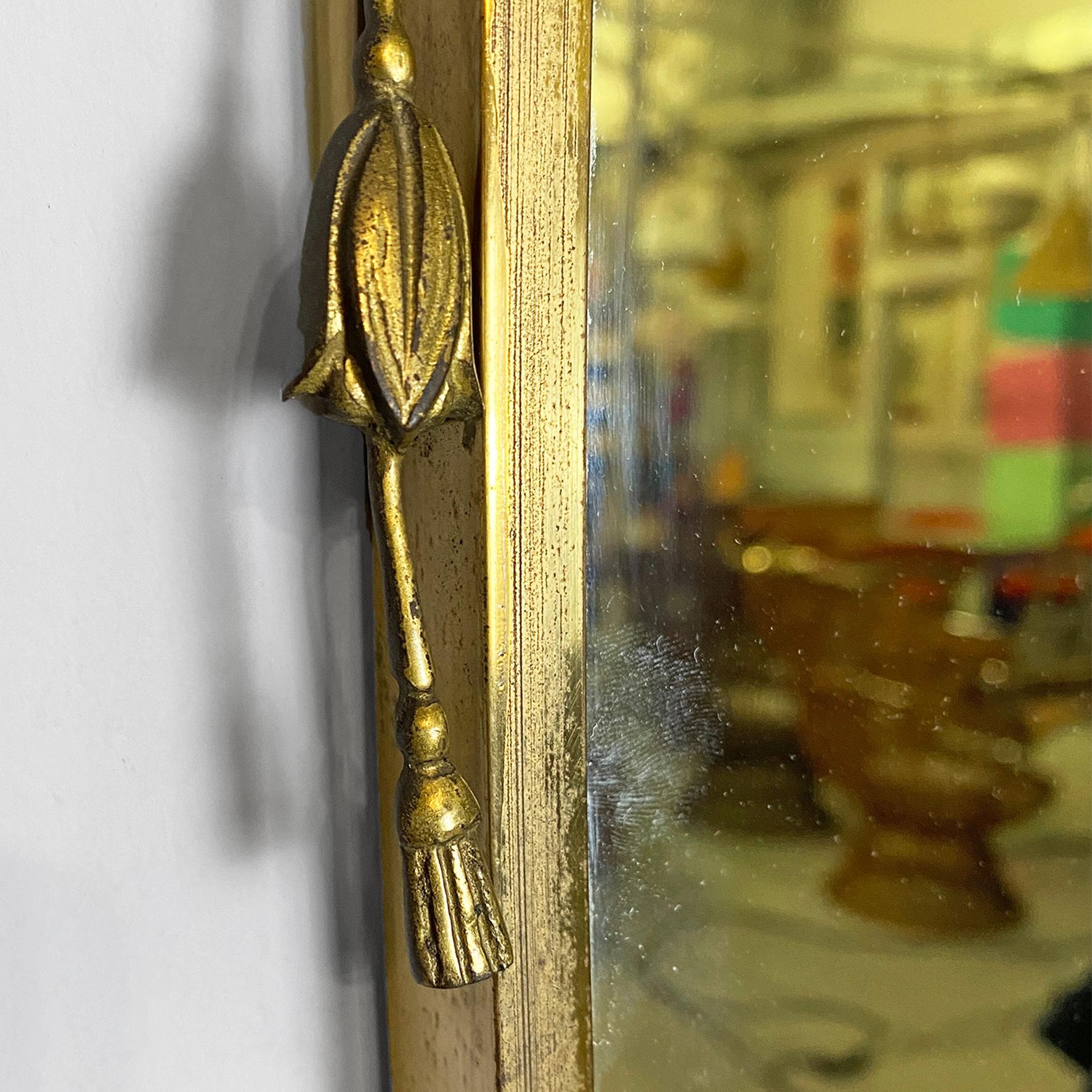 European Italian mid-century modern oval brass wall mirror with classic friezes, 1950s For Sale