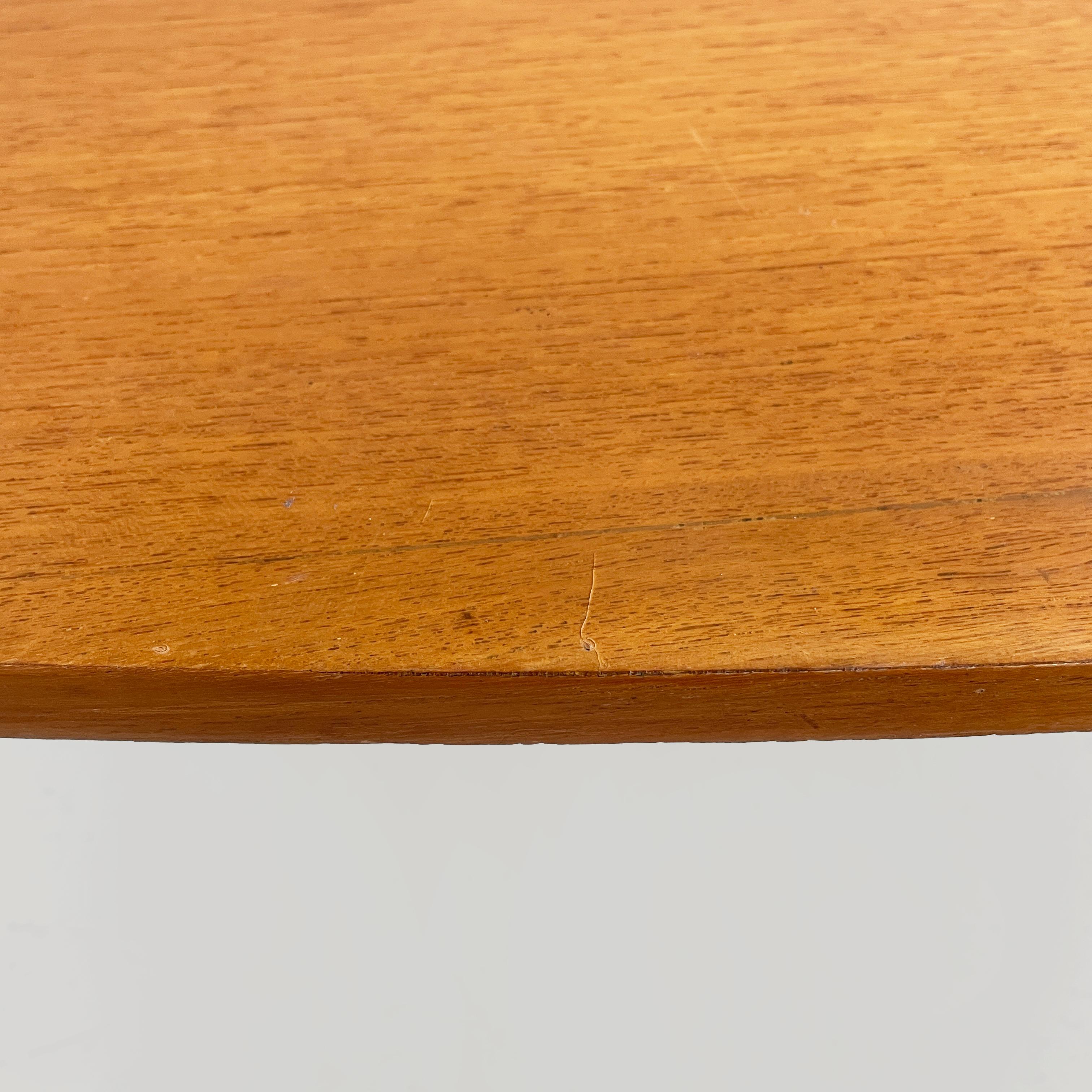 Italian mid-century modern Oval coffee table in wood and black metal, 1960s For Sale 6