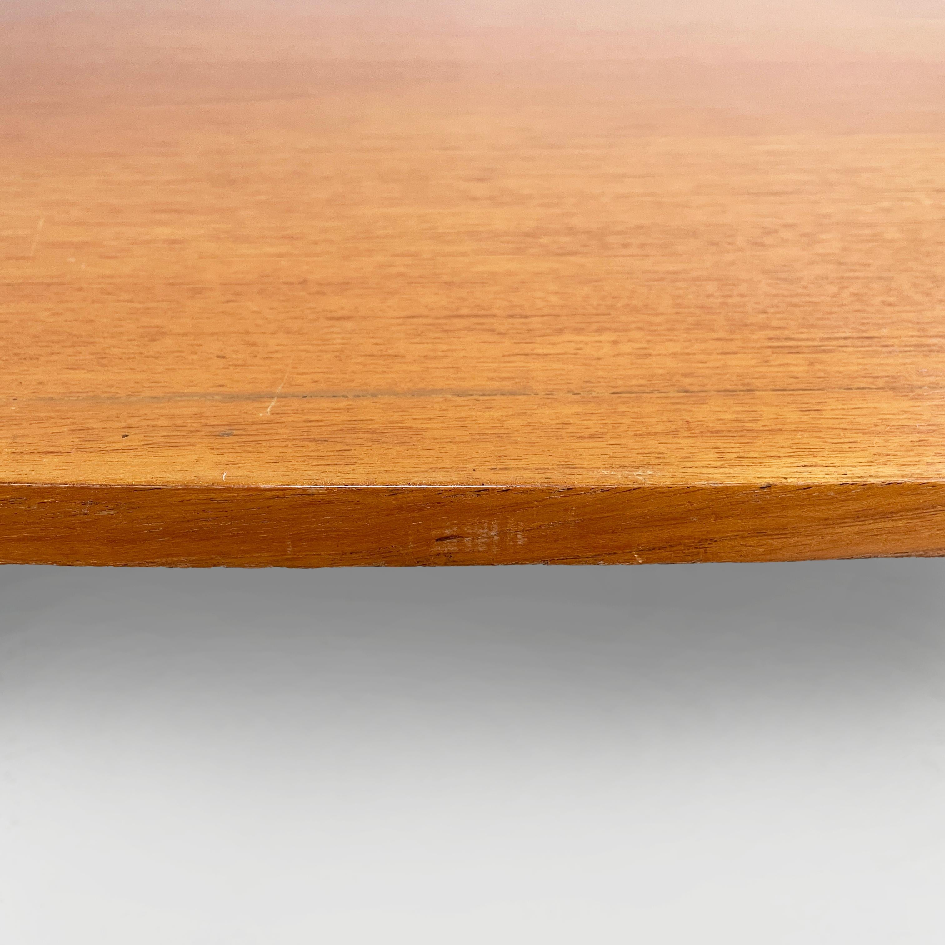 Italian mid-century modern Oval coffee table in wood and black metal, 1960s For Sale 7