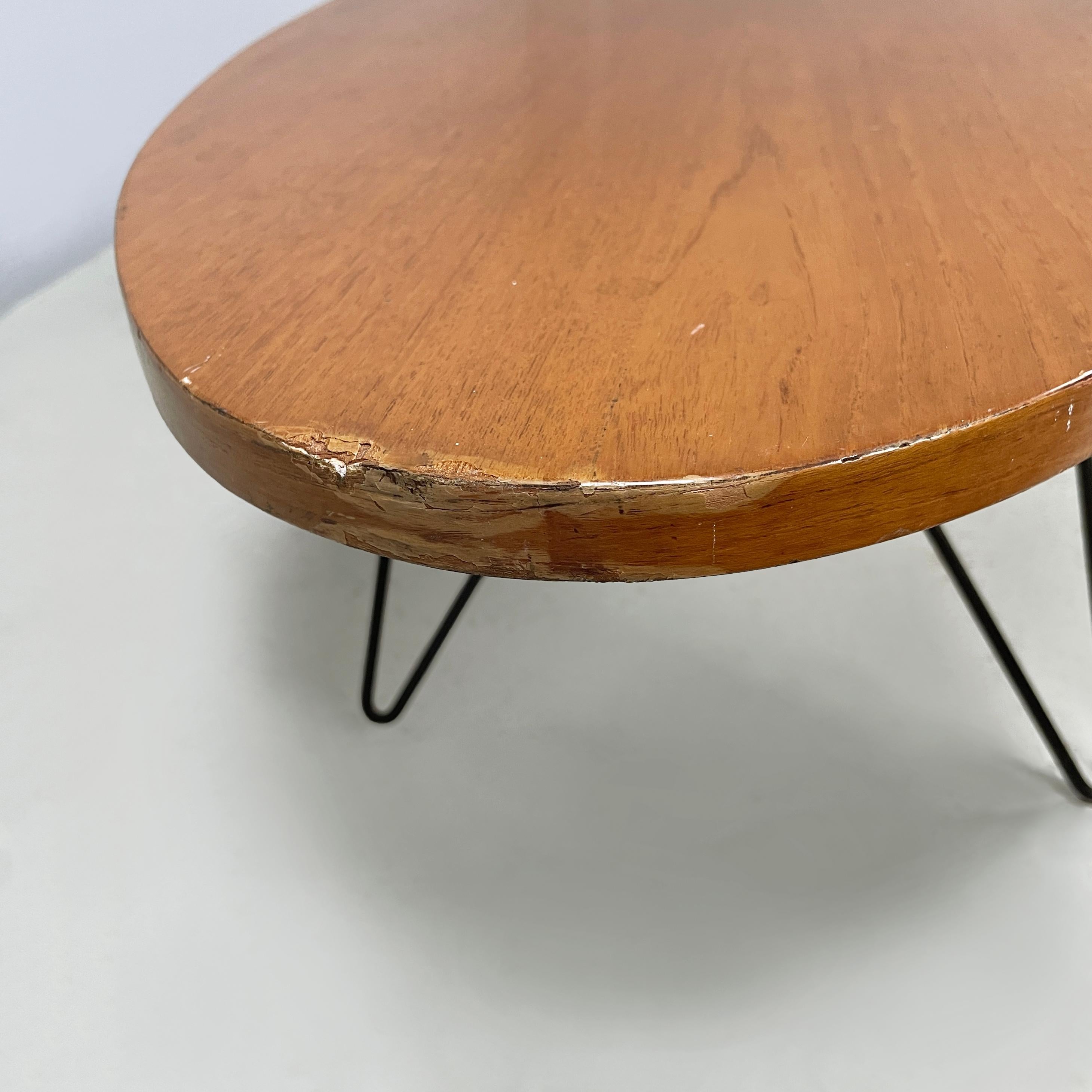 Italian mid-century modern Oval coffee table in wood and black metal, 1960s For Sale 2