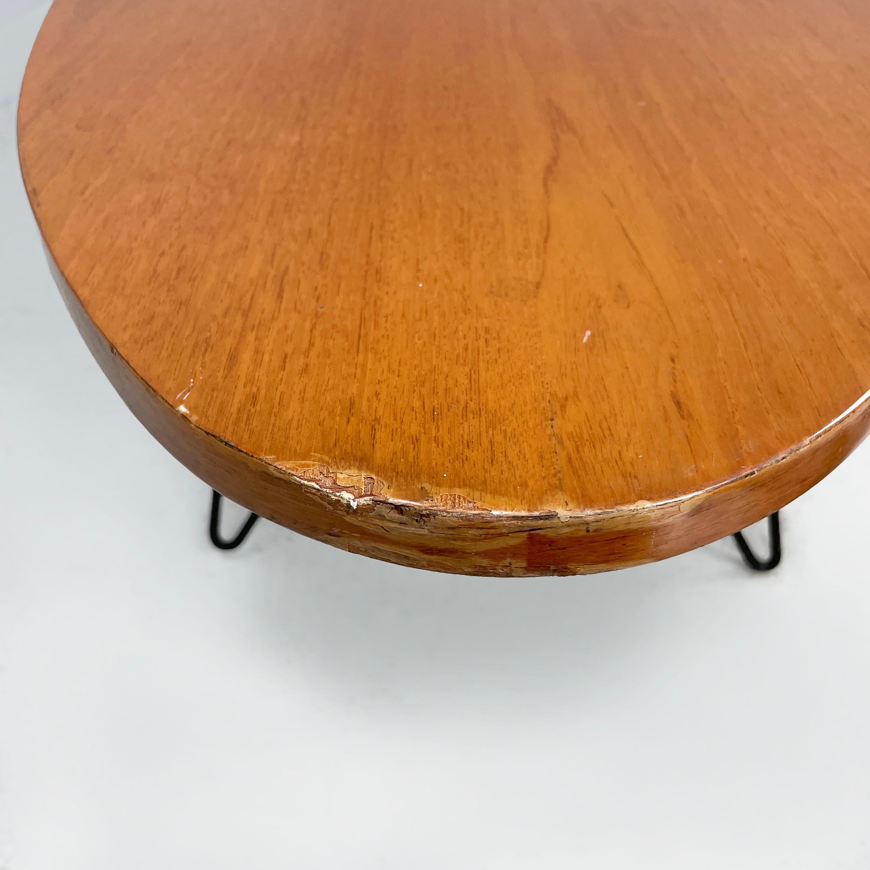 Italian mid-century modern Oval coffee table in wood and black metal, 1960s For Sale 3
