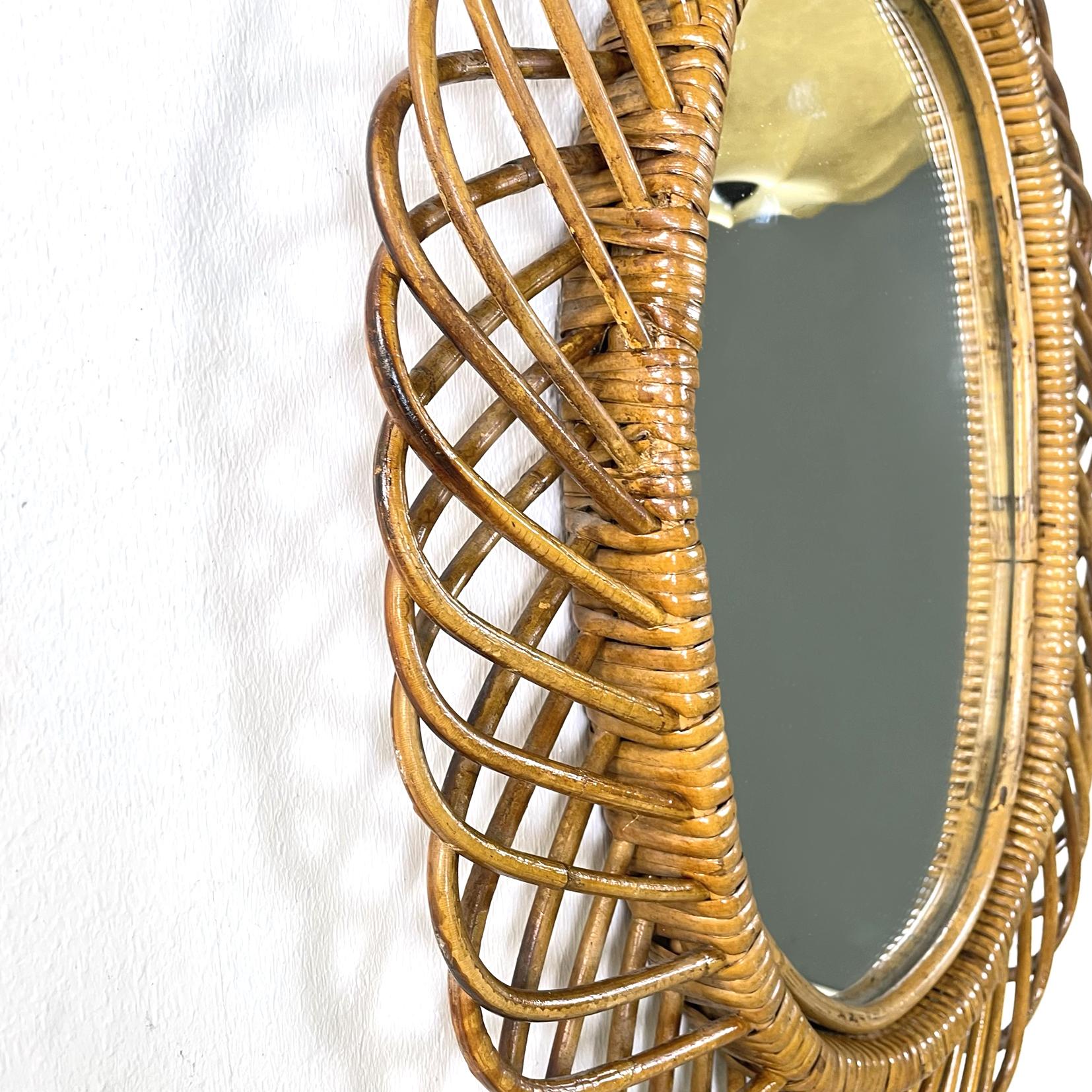 Mid-20th Century Italian mid-century modern Oval wall mirror in rattan, 1960s