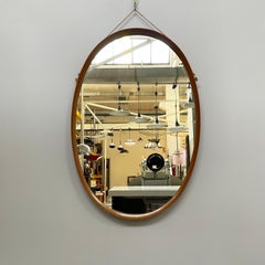 Italian mid-century modern Oval wall mirror in wood and rope, 1960s