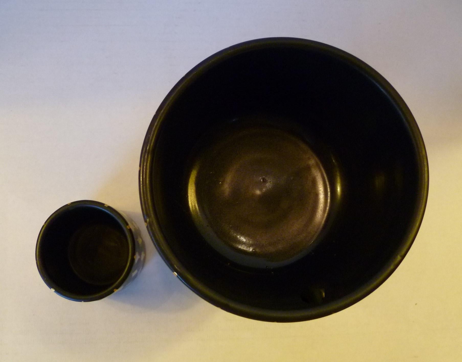 black and gold pottery