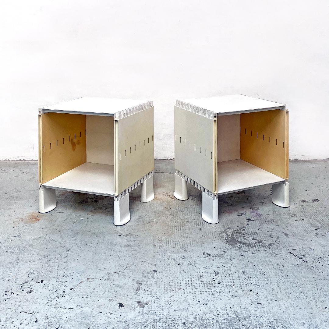 Italian Mid-Century Modern pair of white plastic bedside tables, 1970s
Pair of bedside tables with completely interlocking and removable structure in white plastic with open compartment on the front and always interlocking legs.
Good general