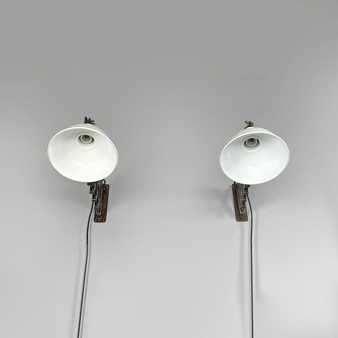 Italian mid-century modern pantograph wall lamps with white metal diffuser 1960s
Industrial style pantograph wall lamps or applique with adjustable arm structure in metal. The round lampshade is adjustable and in glossy white painted metal, while