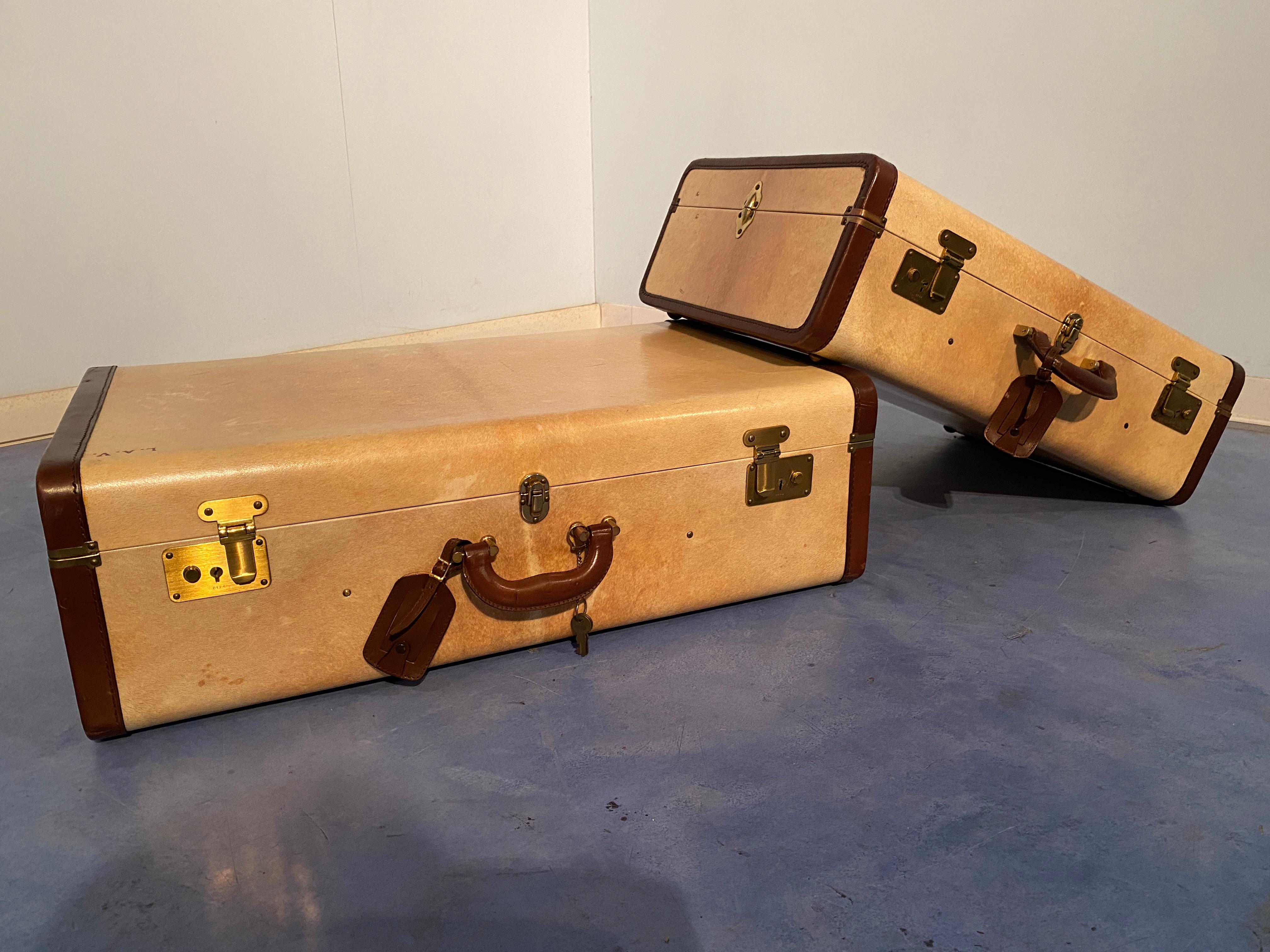 Two parchment suitcases from the 1960s owned by a Milanese nobleman. The details are all refined, which makes them of excellent executive quality. A unique and unattainable piece, perfect for a collection or furnishing. They can still be used today