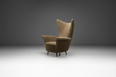 Fauteuil à dossier en forme de pointe, Italie vers 1950
