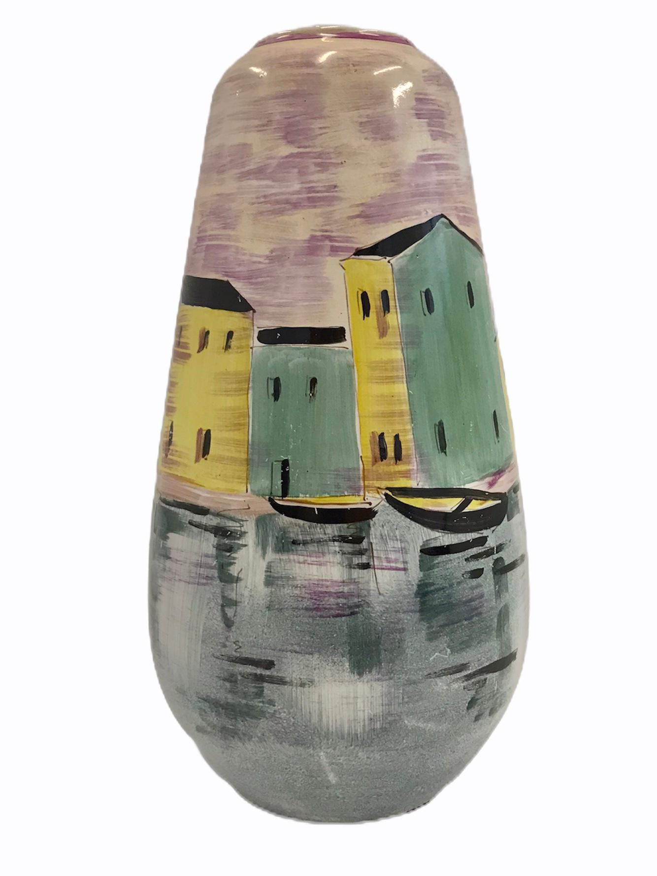 Midcentury Italian pottery vase depicting a nautical harbor scene. This lovely hand painted ceramic vessel with an image of an Italian at the edge of the water. Boats moored and a sail boat with its sail unfurled complement this beautiful serene and