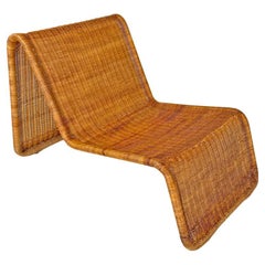 Poltrona in rattan P3 di Tito Agnoli per Bonacina, anni '60.