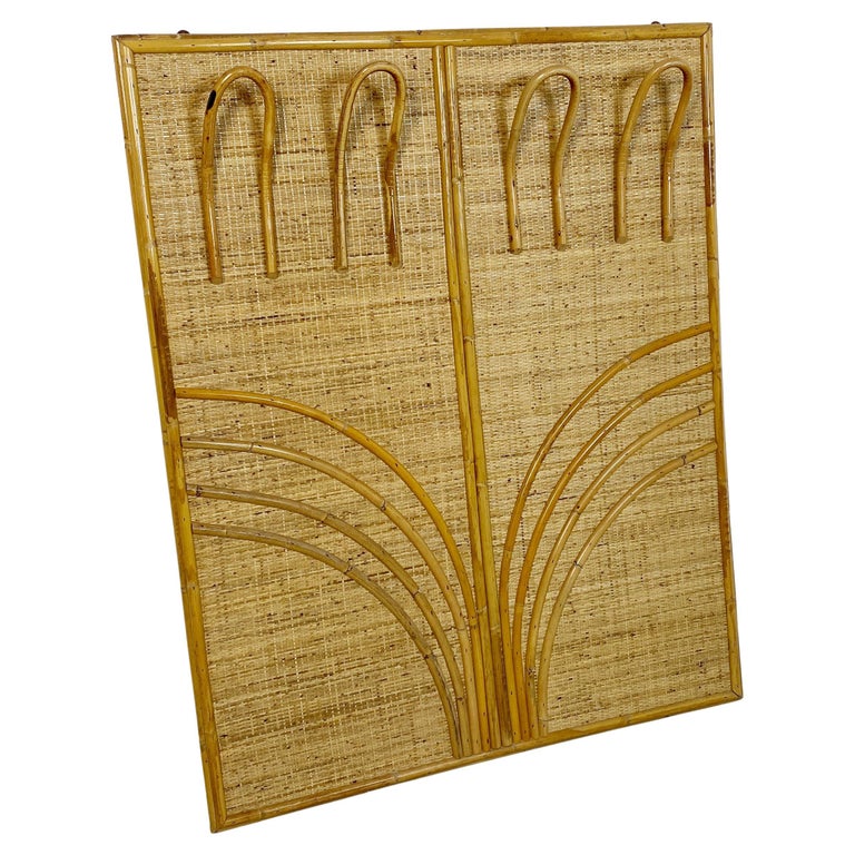 Italian Mid-Century Modern Rattan coat hanger, 1960s
Rattan rectangular wall coat rack panel with four hooks in the style of vivai del sud or Gabriella Crespi design
This can be a spectacular details for your entrance can give elegance and cool