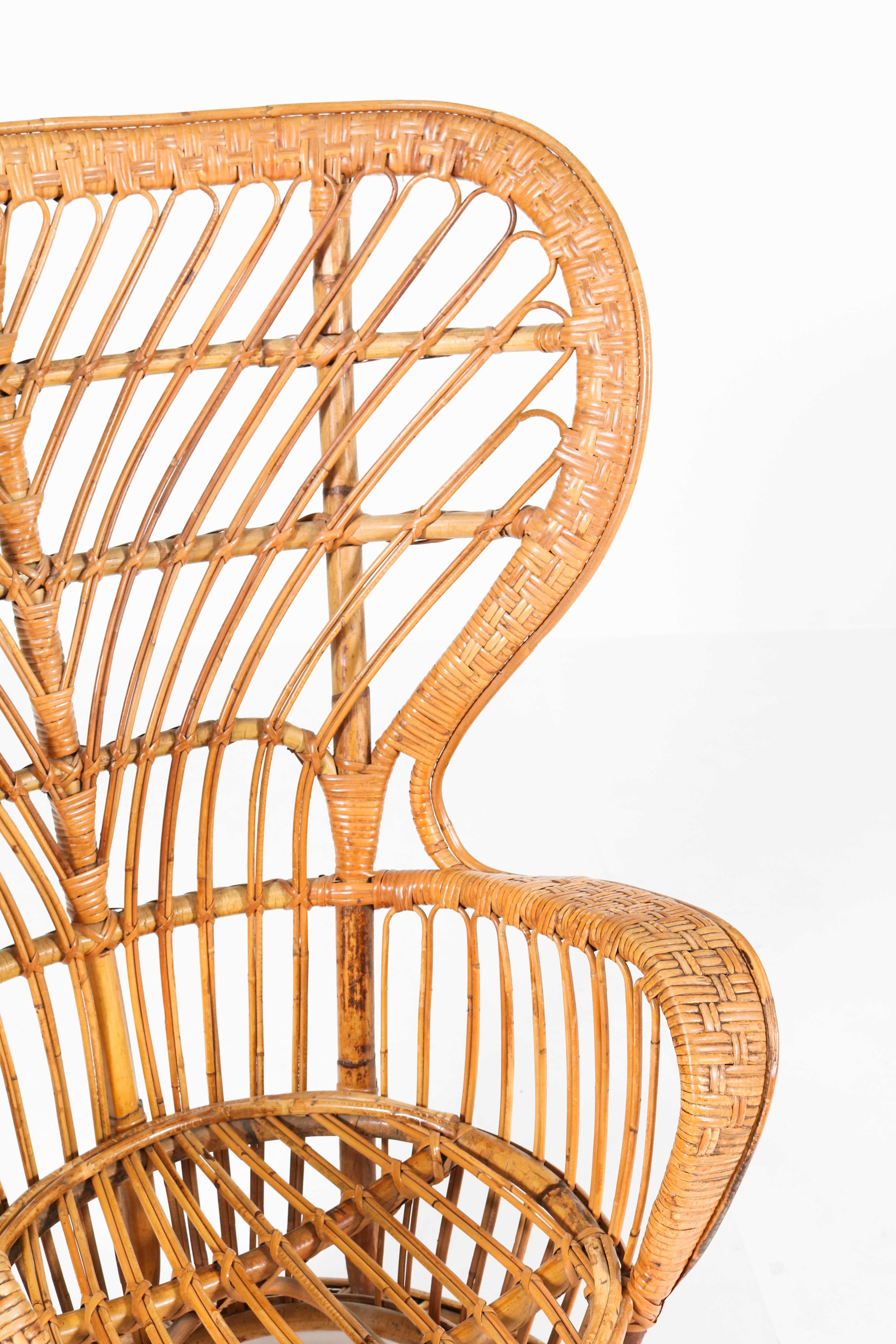 Italienischer Mid-Century Modern-Rattan-Ohrensessel von Lio Carminati für Bonacina 2