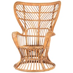 Vintage Italian Mid-Century Modern Rattan Wingback Chair by Lio Carminati for Bonacina