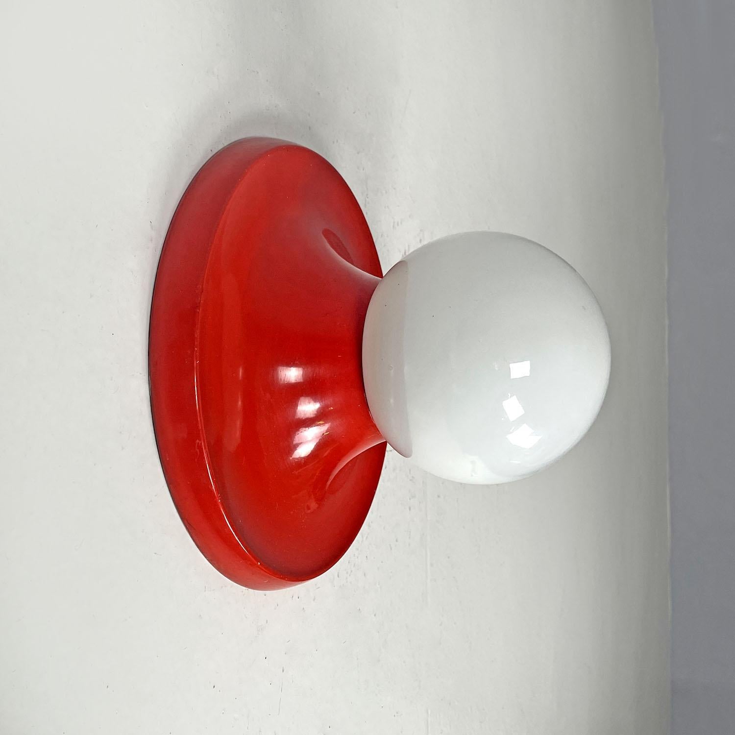 Italian mid-century modern Red wall lamp Light Ball Castiglioni for Flos, 1960s
Wall or ceiling lamp mod. Light Ball with spherical opal glass diffuser. The structure of the round base is in red enamelled metal.
Produced by Flos in 1960s and