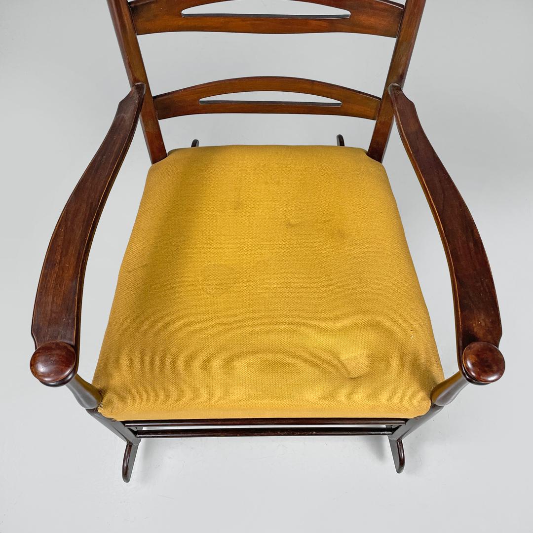 Italian mid-century modern rocking chair in wood and mustard yellow fabric 1960s 4