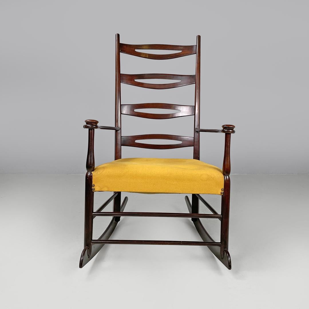 Mid-Century Modern Italian mid-century modern rocking chair in wood and mustard yellow fabric 1960s
