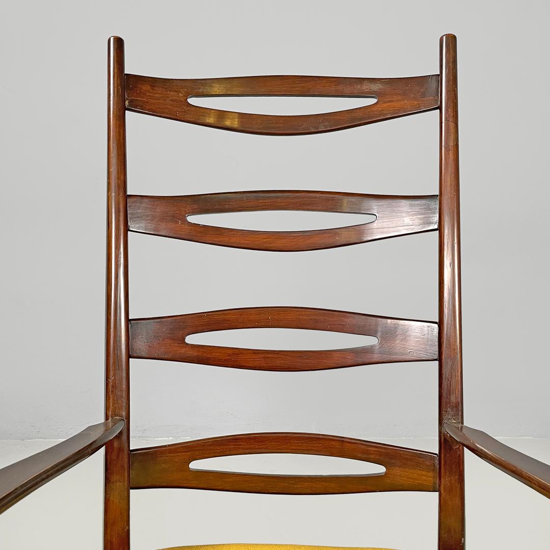 Italian mid-century modern rocking chair in wood and mustard yellow fabric 1960s 2